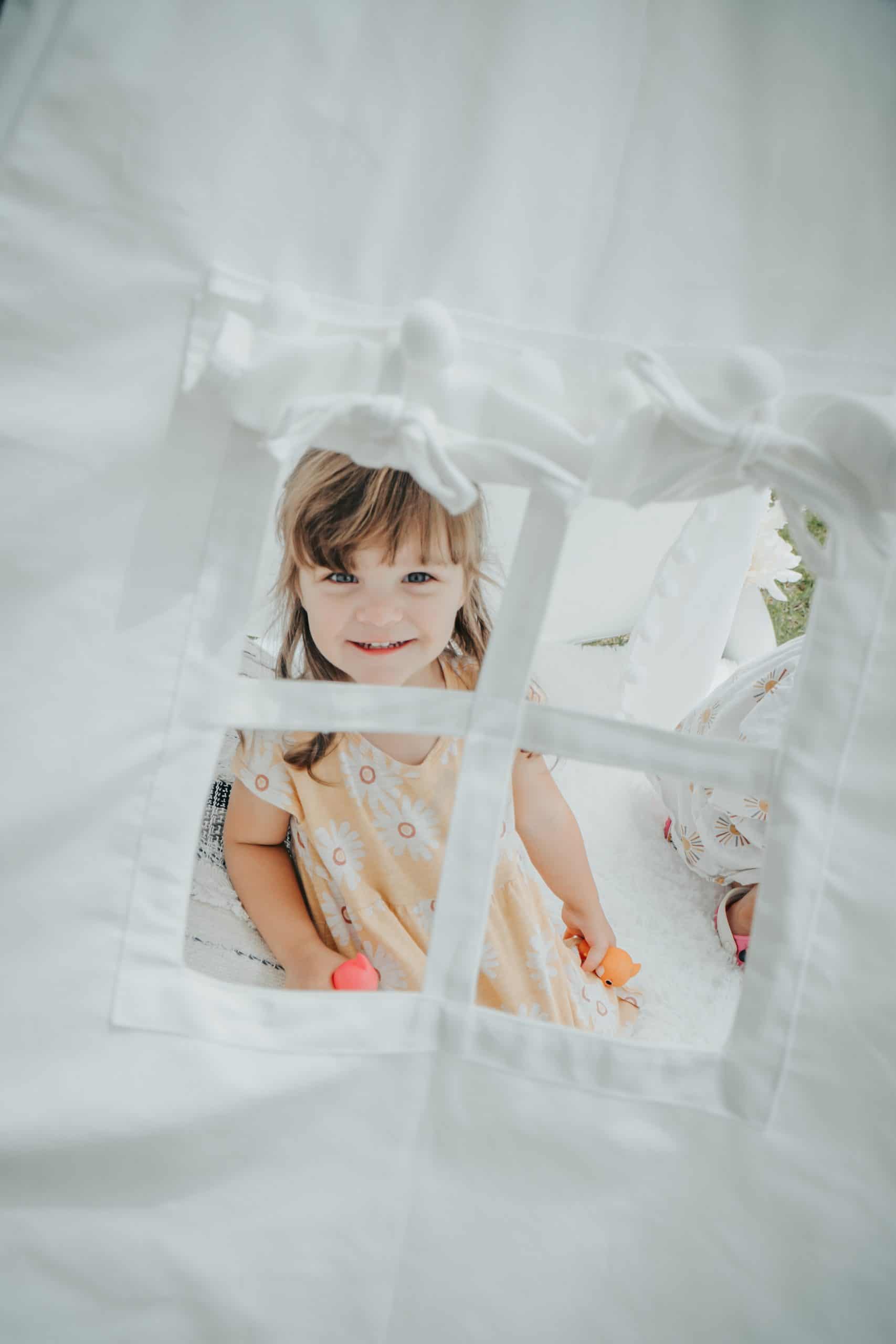 Children Lifestyle Boho Tent Girl Peeking Window - Spring Lake, NC
